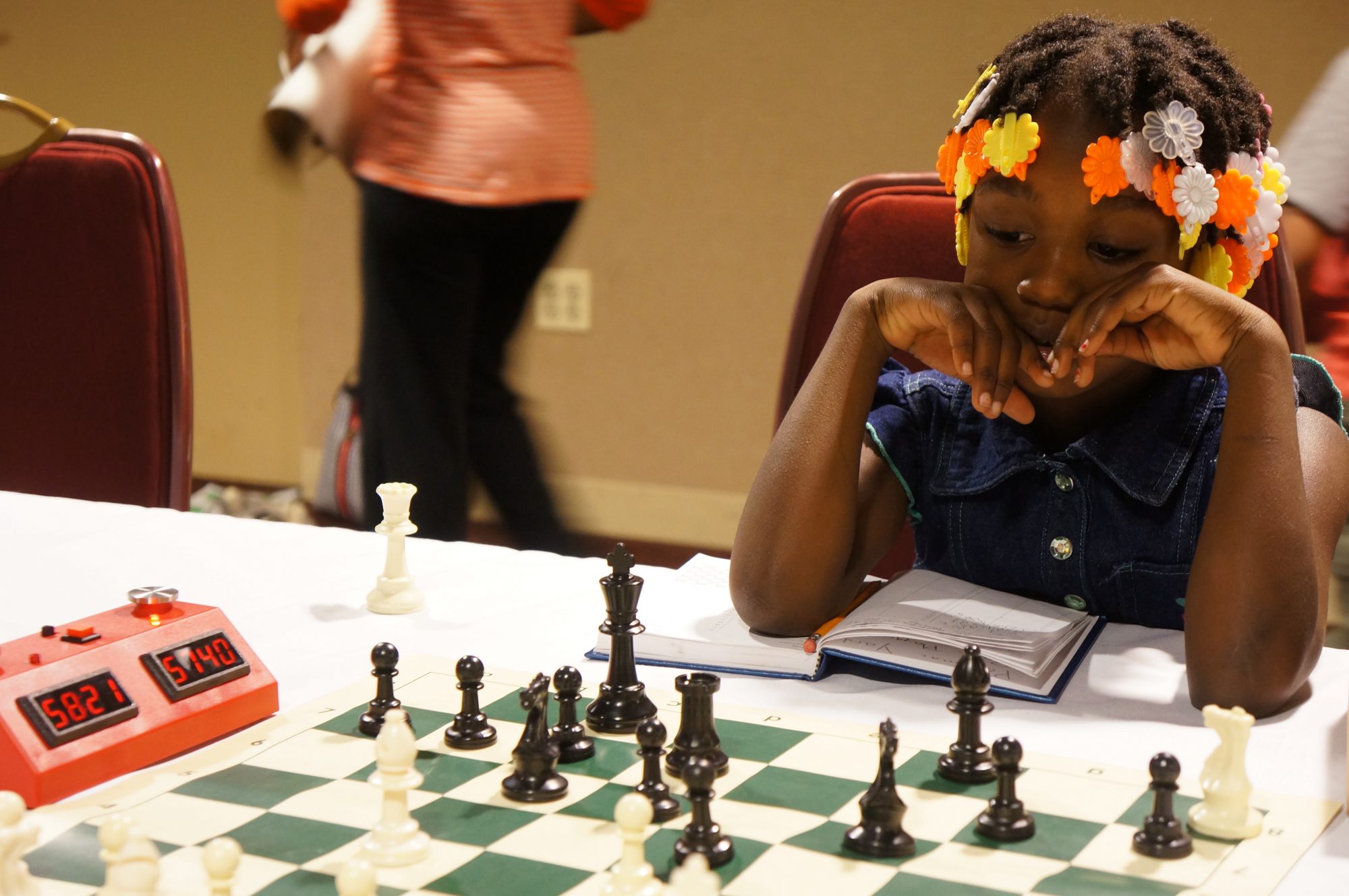 girl kid playing chess
